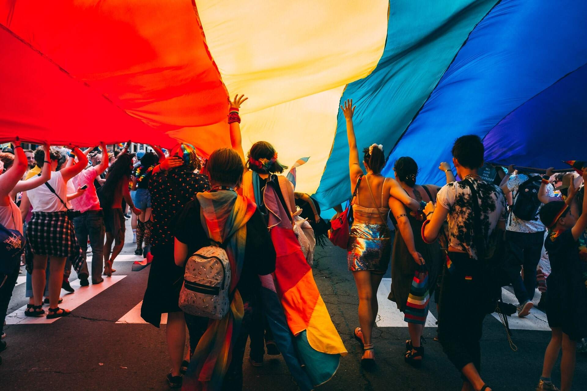 Pride March Under Pride Flag
