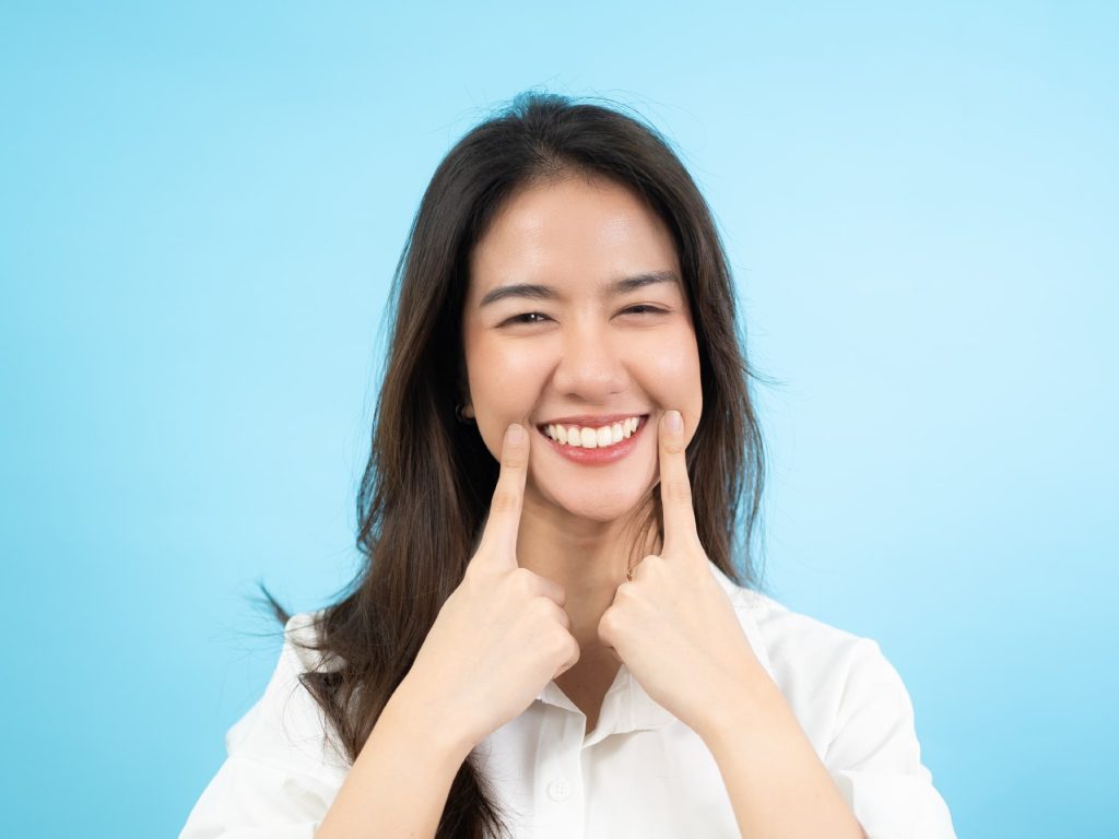 Woman flashing a straight smile